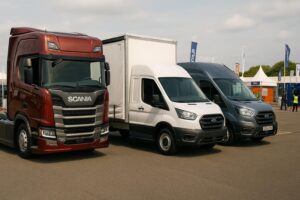 A Scania HGV tractor Unit, a White Luton Van and a Ford Transit van, parked together. Just a small selection of the commercials vehicles Evogo Asset Finance fund.