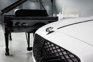 The famous Bentley grill, at the side of a black Steinway grand Piano