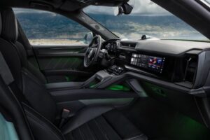 Press release image of the new Porsche Cayenne Turbo EV Interior shown from the passenger side