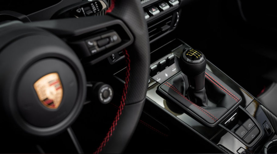 Interior image of the newly released Porsche GT3 S/C in guards red, showing the manual gearbox