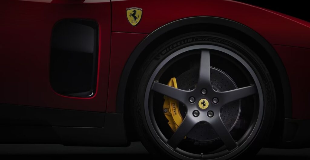 Red Ferrari Luce wheel and emblem